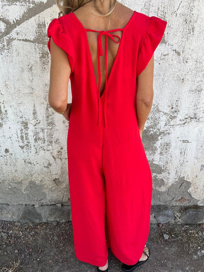 Linda | Leopard Print V-Neck Jumpsuit With Front Pockets